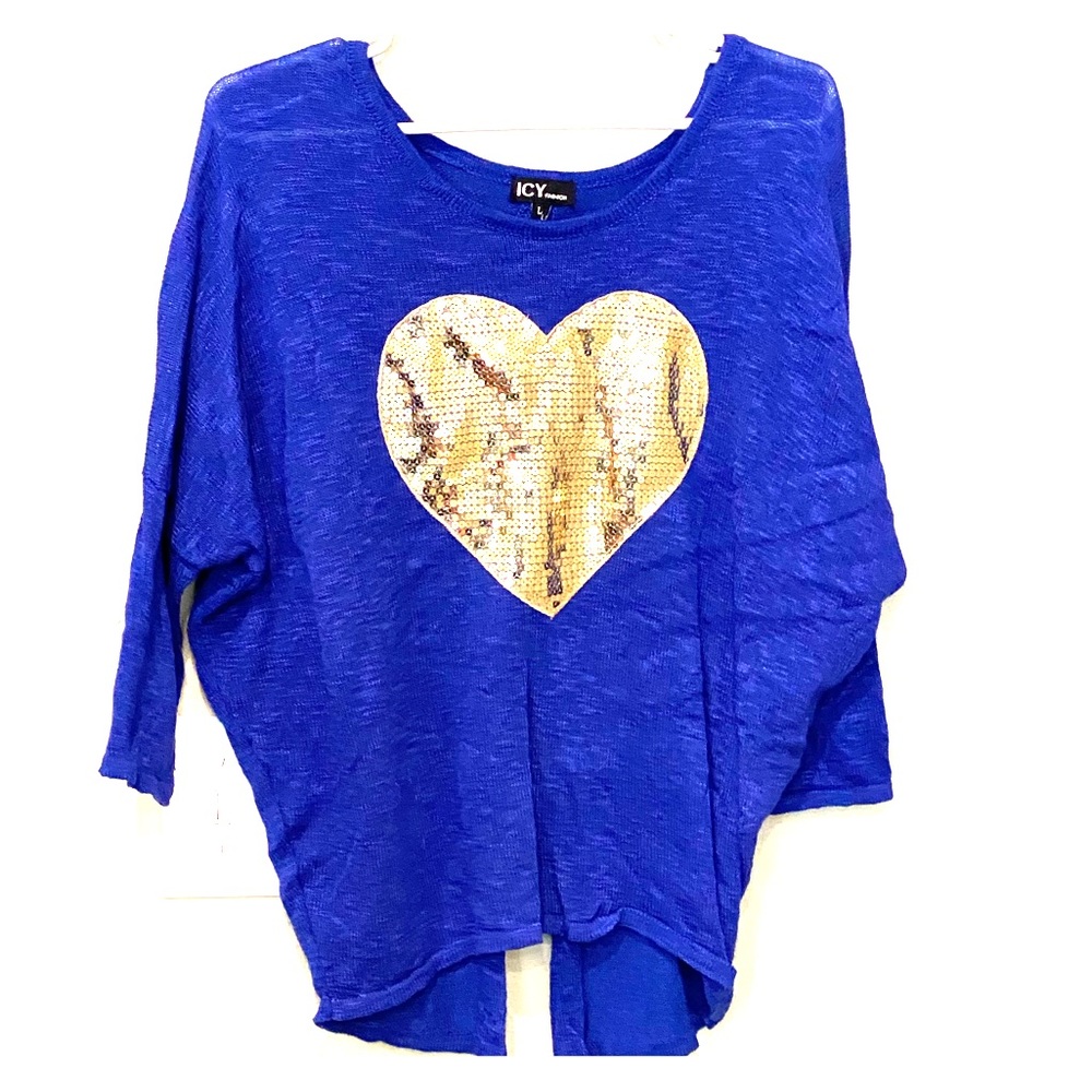 Bright blue blouse with sequined gold heart